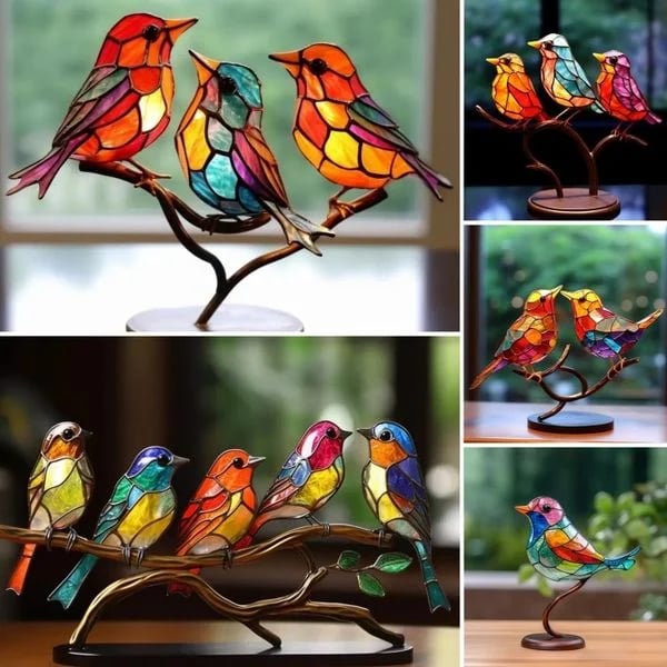 Colorful bird table decoration on tree branches